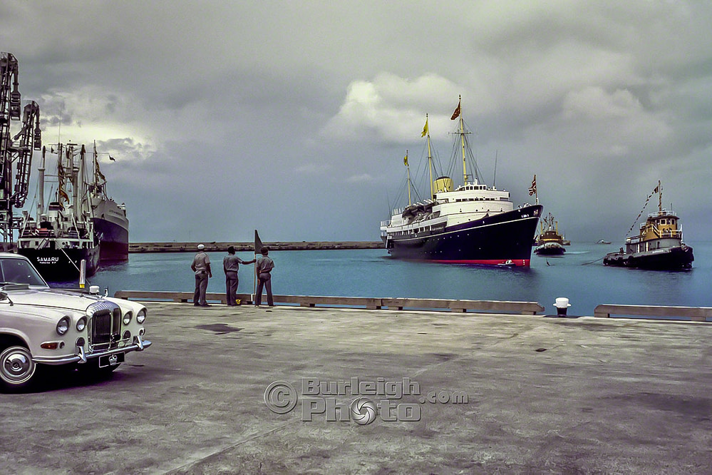 HMY Britannia is brought into the Barbados Deepwater Harbour to begin the last visit of her Silver Jubilee Tour, 1977