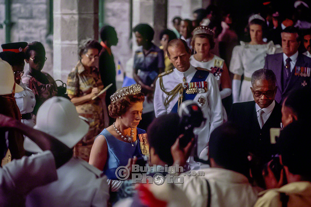 Queen Elizabeth is accompanied to the Senate Chambers by the President of the Barbados Senate, Dr. Arnott Cato. Silver Jubilee, 1977