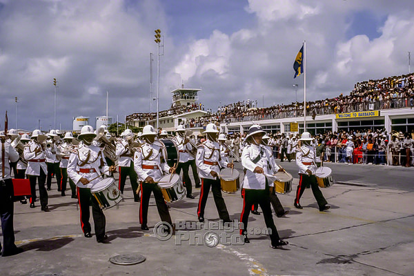 The Royal Barbados Police Band entertain the crowds awaiting the arrival of Her Majesty bgv13-06